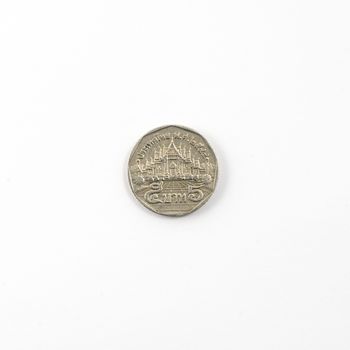 Thai coin from 5 Bath on a white surface