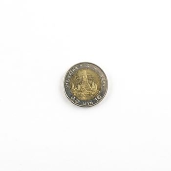 Thai 10-baht coin on a white surface