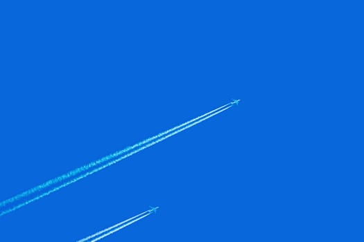 Two Jet Airplanes in the Blue Sky