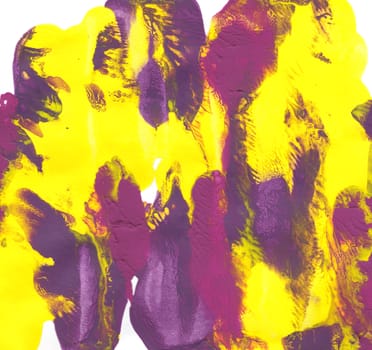 Abstract daubs of yellow, purple and magenta paint on white paper background