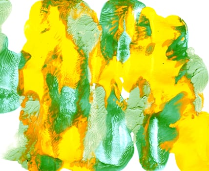 Splotches of yellow and green abstract paint on white paper background