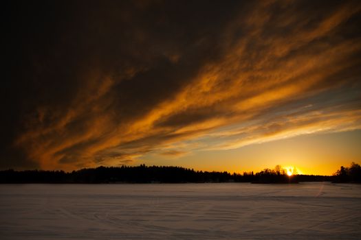 A very strong cloud above the frozen sea. Image taken in Luvia, Finland.