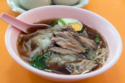 Thai style stewed duck meat noodle soup
