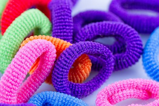 the hair multicolored rubber bands grouped close-up