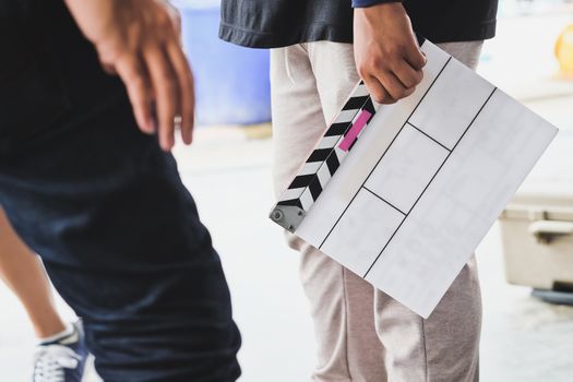 Film Slate, close up image of film production crew holding Film Slate on set