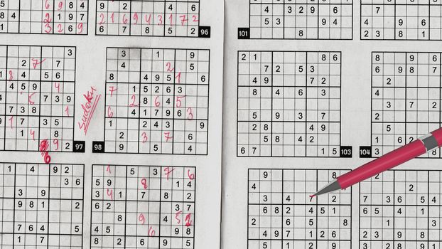 An amazing 3d rendering of Sudoku mathematical grids with printed digits, columns, rows and empty boxes filled with handwritten rosy numbers. A pink pen lies on this puzzle
