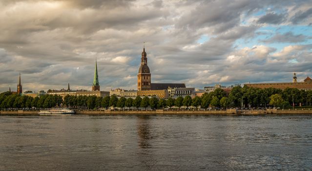 View of the old town of Riga from the river side in a summer evening