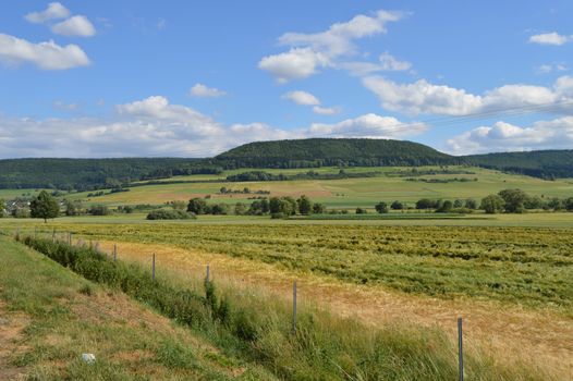 View of the countryside with fields and forests in the Land of Baden-Württemberg in Germany