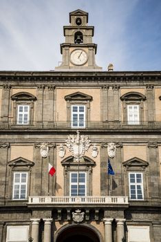 Facade of the historical Royal Palace in Naples, Italy
