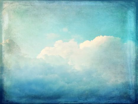 Vintage blue sky background. Clouds and sunlight.