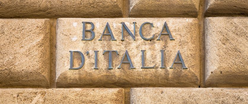 Banca d'Italia (bank of Italy) text on an old wall close to the entrance of the institute in Lecce