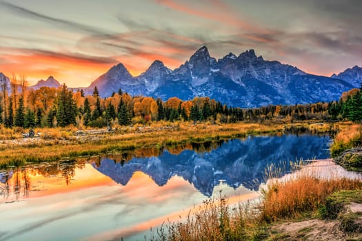 Beautiful sunset over th Grand Tetons from Schwabacher's landing in Grand Teton National Park, WY