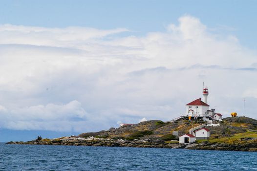 Lighthouse on small island of Vancouver Island in Haro Straight