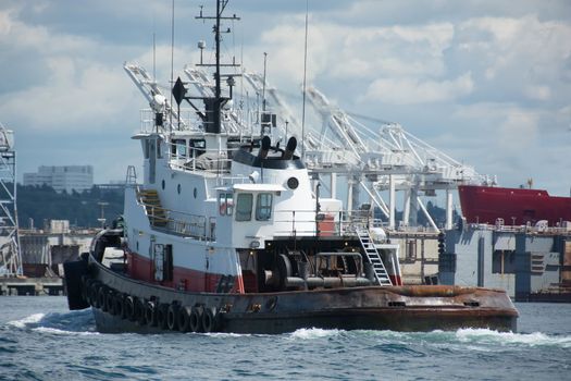 Tug making way on Duwamish Waterway - Seattle, WA, cloudy sky