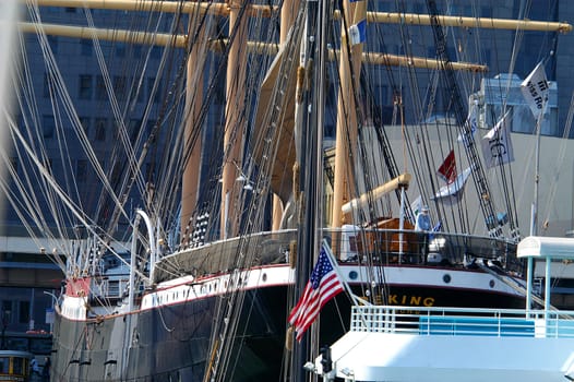 Intricate patterns in the rigging of a tall ship