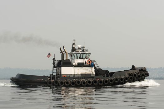 tug transiting Shilshole Bay on the way north