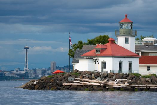 Seattle's Alki Point Lighthouse taken from the water on a flat lit day