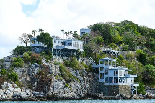 House entirely on stilts on tip of rocky point in British Virgin Islands.