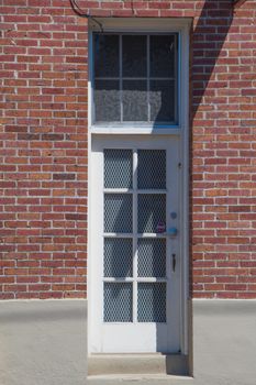 Windows in red brick building in small town, Washington State