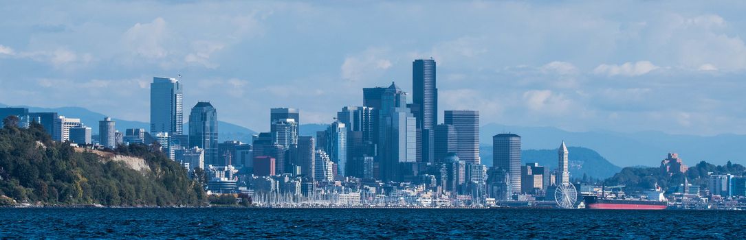 View of Seattle from Magnolia, taken from boat with Magnolia Bluff to the left and Smith Tower to the right