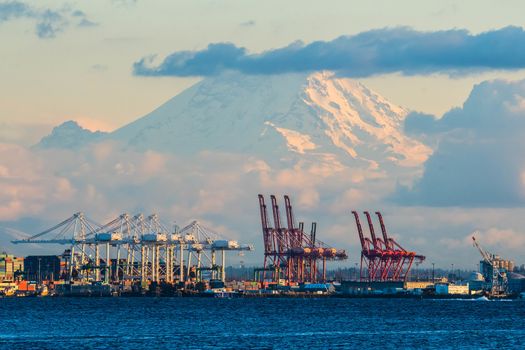 Seattle Container Terminal with Mount Rainier in the Background with clouds just before sunset