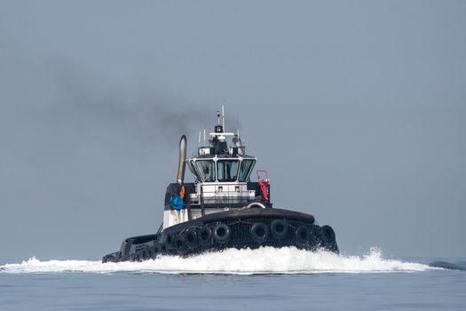 Ocean Going Tug transiting Shilshole Bay on the way north on a lightly foggy day