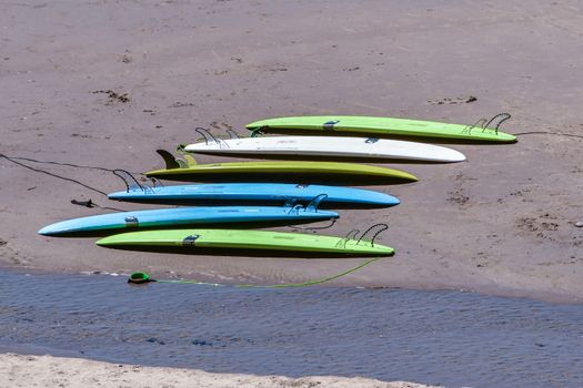 Surfboards on the beach at Ecola State Park, Oregon