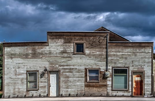 Building showing its age and in need of painting located in rural Washington State