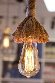 Decorative antique edison style filament light bulbs hanging