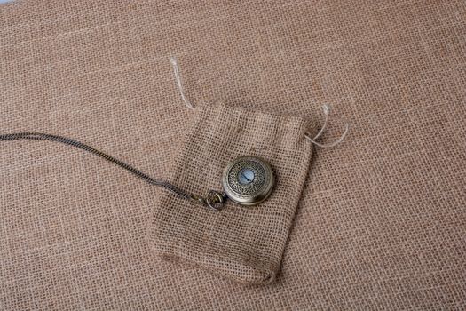Mechanical pocket watch on a sack