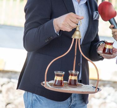 Turkish tea is served in traditional glass