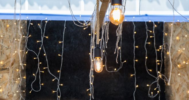 Decorative antique edison style filament light bulbs hanging