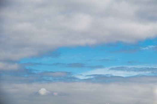 Dark and grey clouds are in the sky