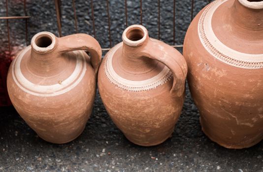 Ancient metal jug in oriental style  in antique market