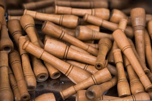 Plenty of brown color wooden cigarette holder