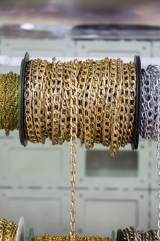 Rolls of decorative chains in view
