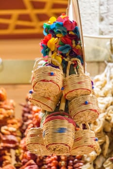 Empty wicker baskets are for sale in a market