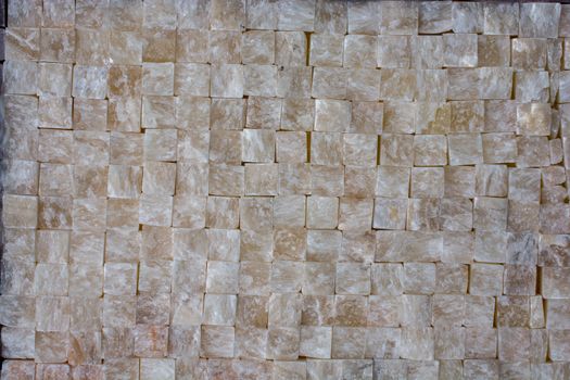Decorative cubic stone wall as background texture