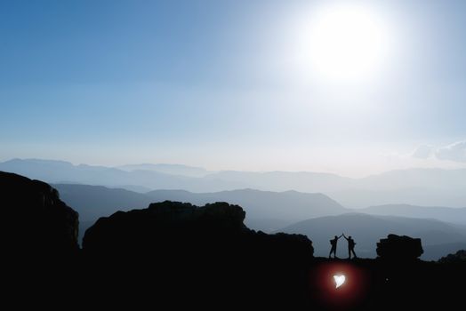 Successful mountaineers at the height of the mountains