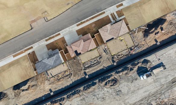 Drone Aerial View Cross Section of Home Construction Site.