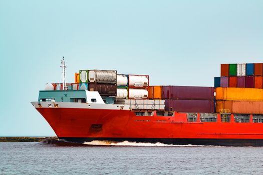 Red container ship. Logistics and production export
