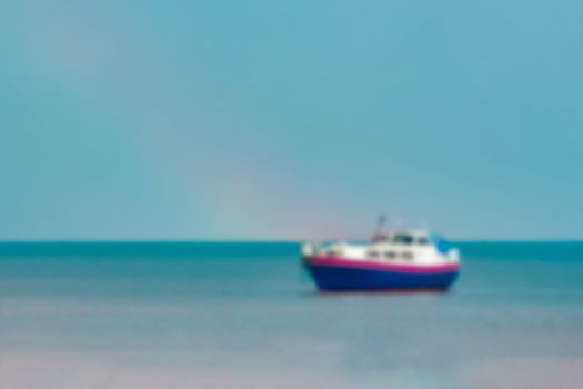 Blue passenger ship - soft lens bokeh image. Defocused background