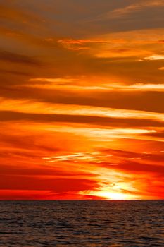 Hot and romantic sunset over the Baltic sea. Calm landscape