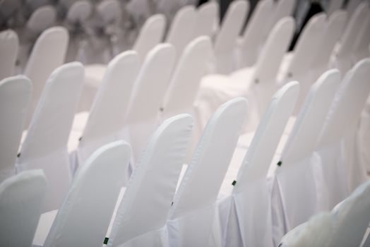 chair with white cover cloth in conference room