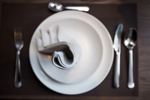 napkin on plate table setting