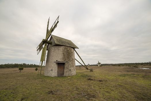 Windmill on Gotland, Sweden with a cloudy sky.
