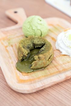 green tea lava cake with ice cream and green tea sauce