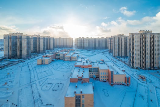 New modern residential building against blue sky in winter