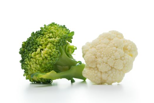 Fresh ripe organic broccoli and cauliflower isolated on white background