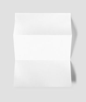 Blank folded White A4 paper sheet mockup template isolated on grey background